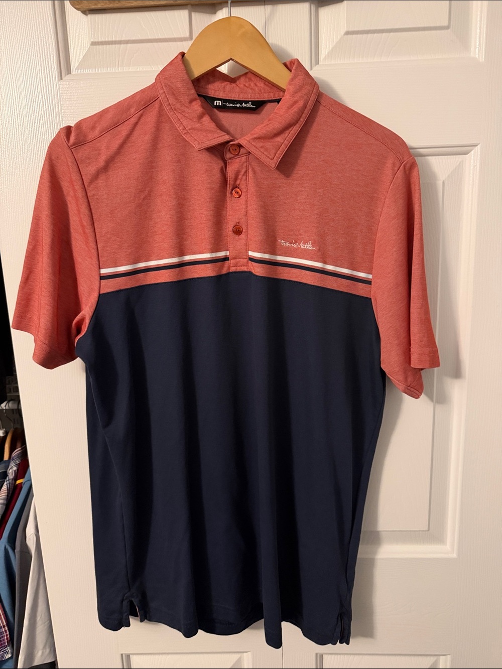 Travis Mathew Coral and Navy Colorblock Polo